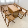 bộ bàn ăn gấp gọn 6 ghế màu nâu óc chó thiết kế cực kỳ thông minh có khả năng xếp gọn 2 cánh có gắn bánh xe dễ dàng di chuyển chất liệu làm hoàn toàn bằng gỗ tự nhiên