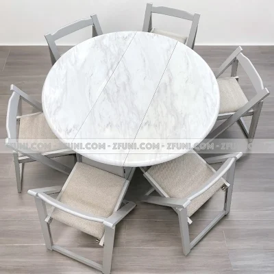 bàn ăn tròn mặt đá thông minh gấp gọn với đường kính 1m2 ngồi được từ 6 đến 8 người có lắp bánh xe tiện dụng trong việc di chuyển